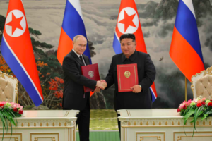 Putin signs mutual defense pact with North Korea into law